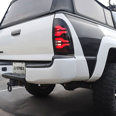 05-15 Toyota Tacoma LUXX-Series LED Tail Lights Black | AlphaRex