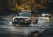 A 3rd gen Tacoma with a Backwoods Adventure Mods front bumper