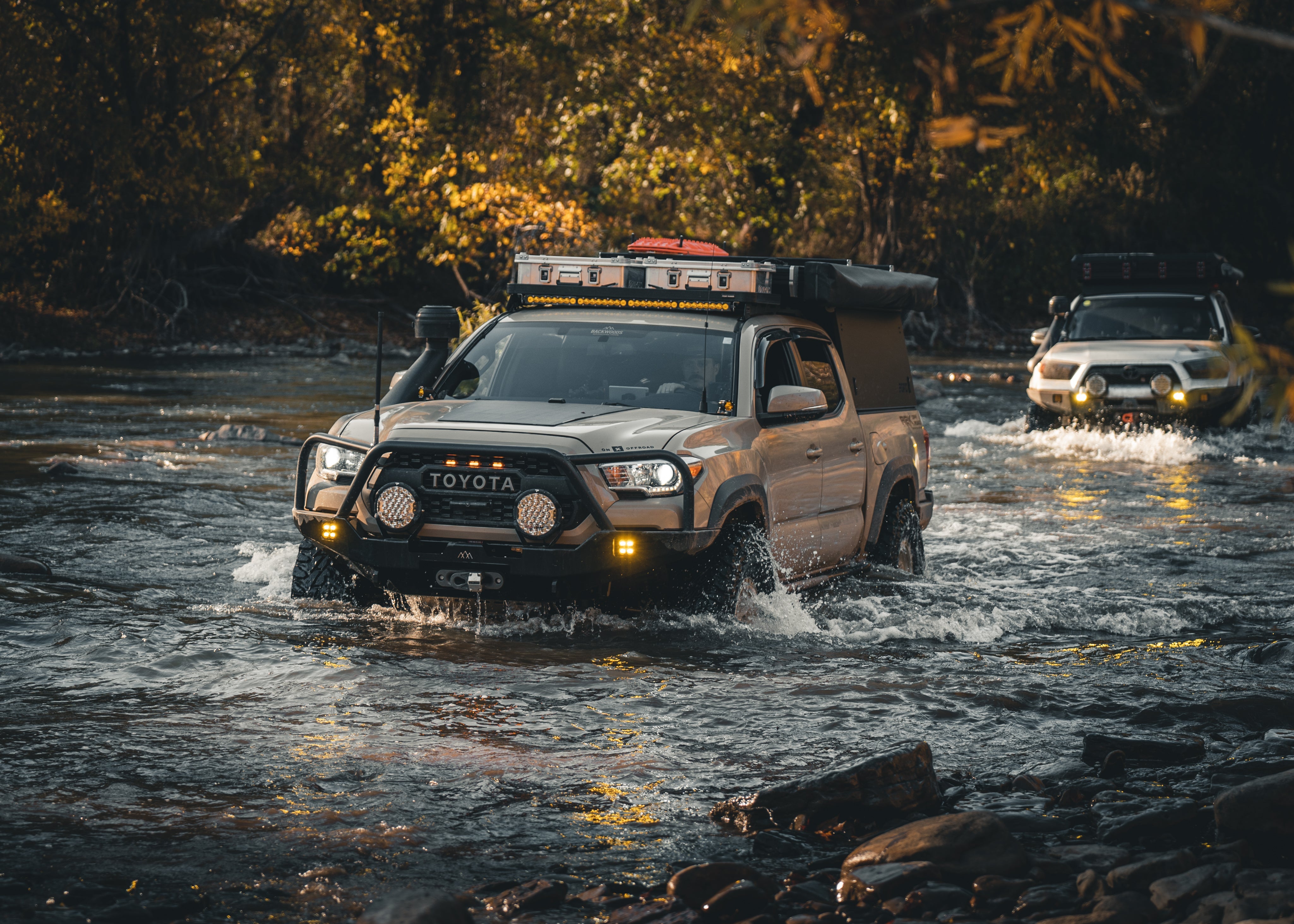 A 3rd gen Tacoma with a Backwoods Adventure Mods front bumper