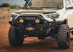 Close up view of a 5th Gen 4Runner with  Backwoods Adventure Mods front bumper and Baja Designs lights