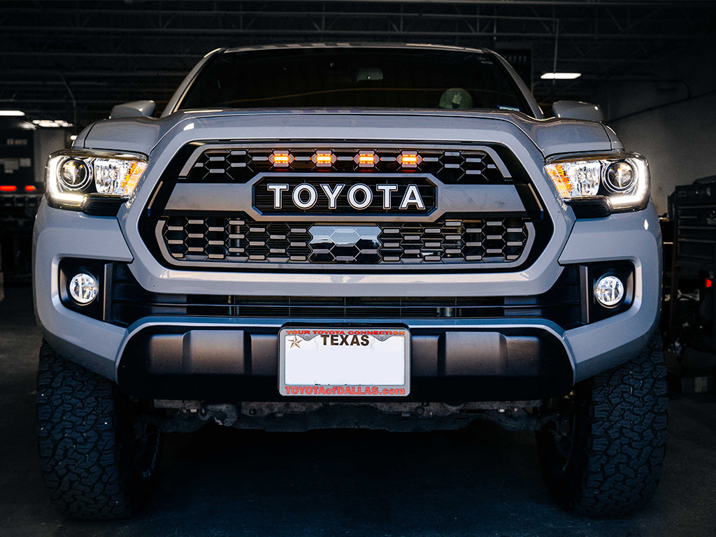 Tacoma fitted with TRD Pro Grille Raptor LED Light Kit