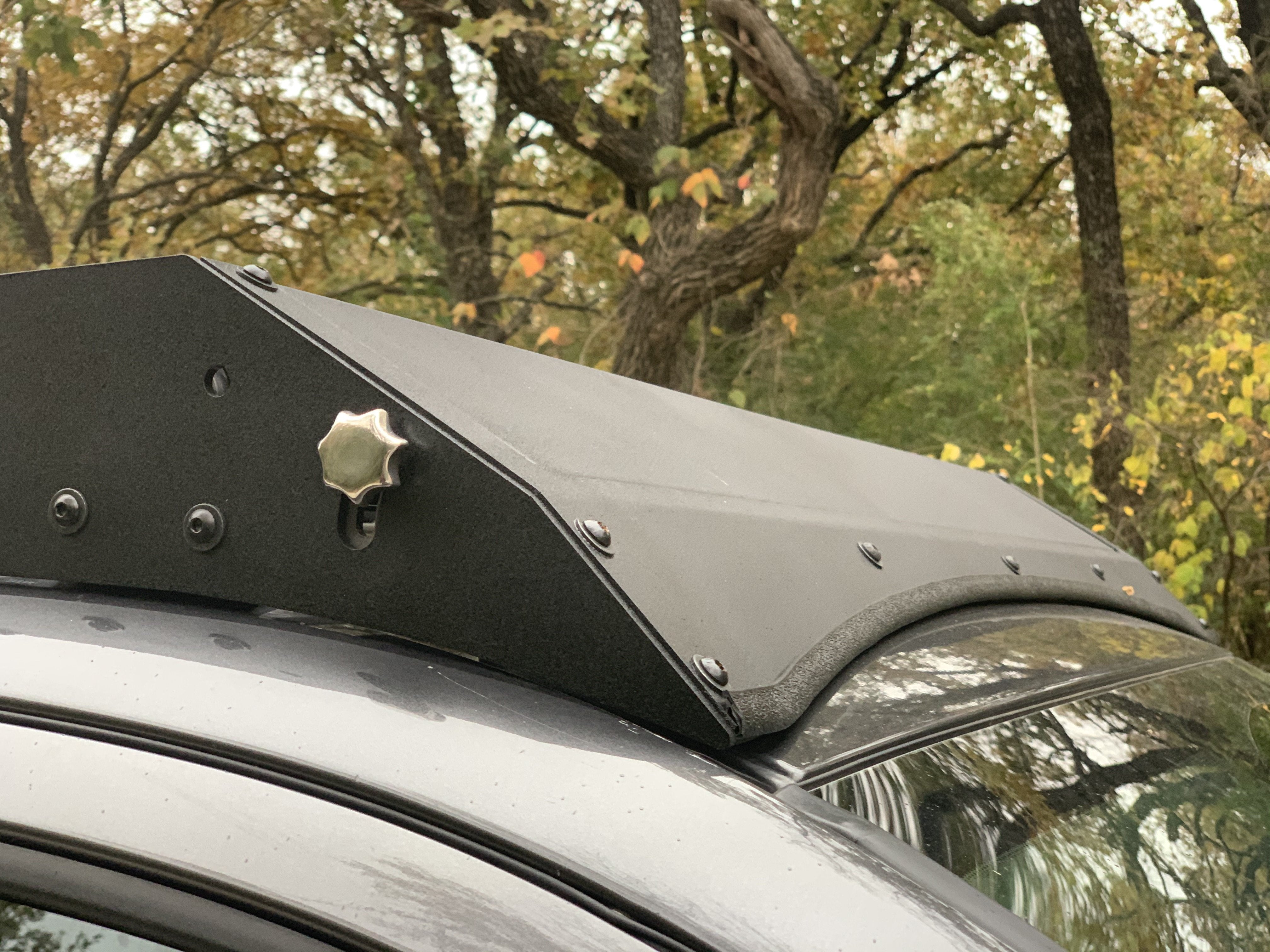 Close up view of gray Toyota Tacoma with Premium Roof Rack with covered light bar - Cali Raised LED