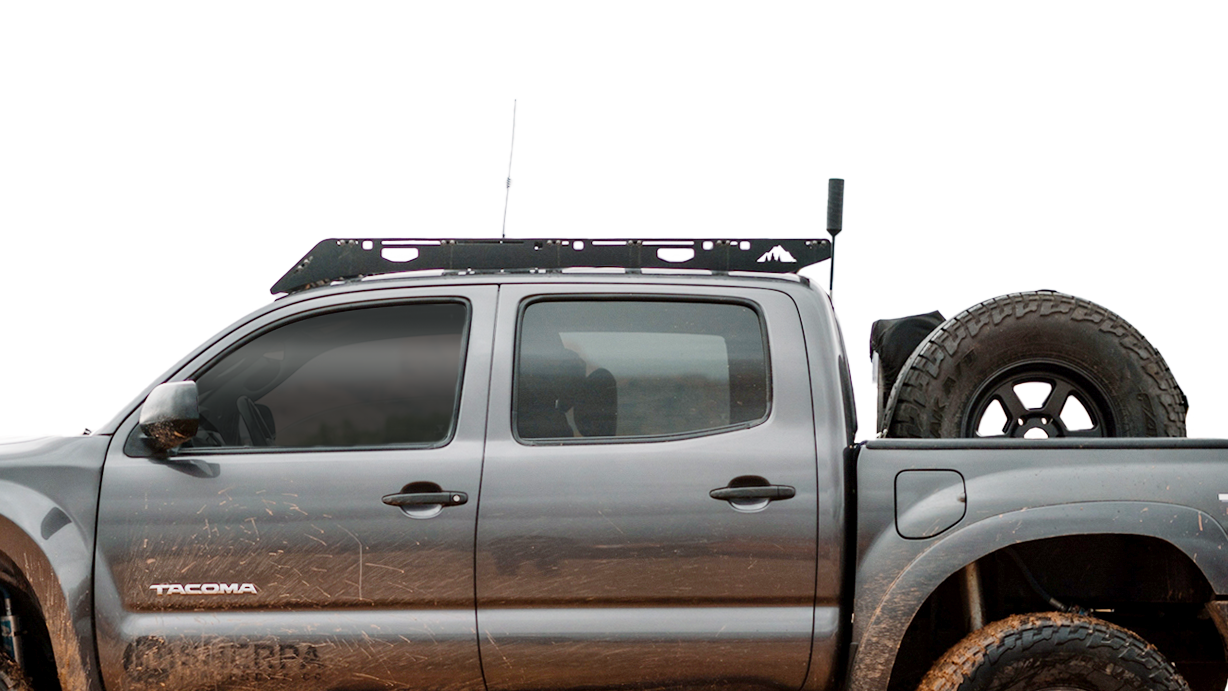 Grey 2nd gen tacoma with a Sherpa Grande Teton roof rack side view