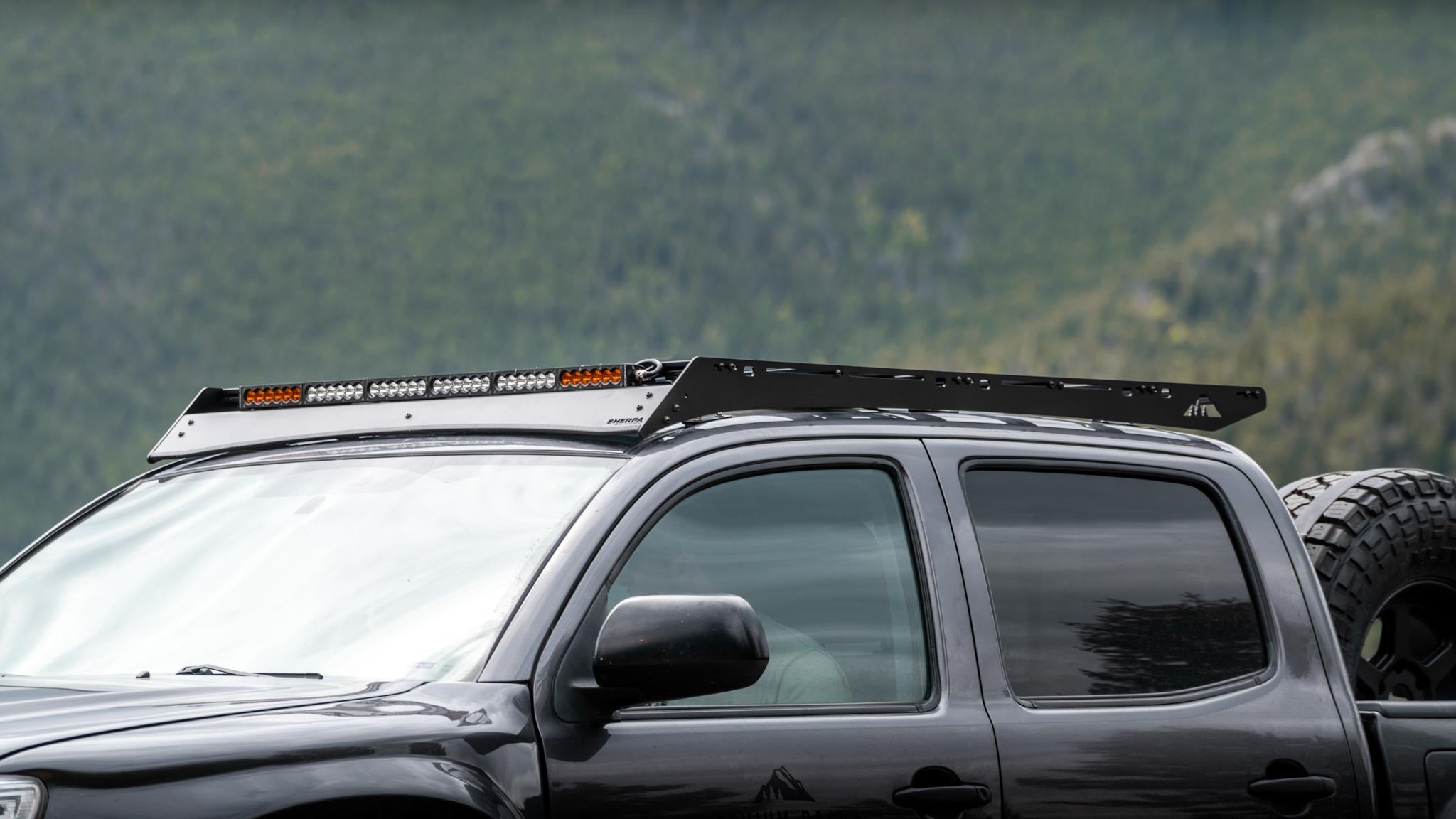 Complete view of Sherpa Grand Teton Sport roof rack with light bar