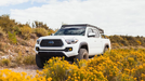 White 3rd gen Tacoma with a Sherpa Grand Teton roof rack